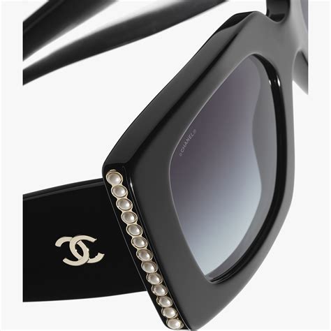 chanel sunglasses black with gold filigree temples|CHANEL.